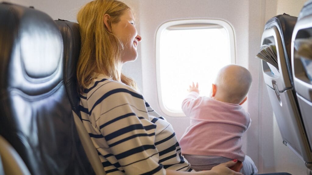 Mother-in-flight-with-her-baby