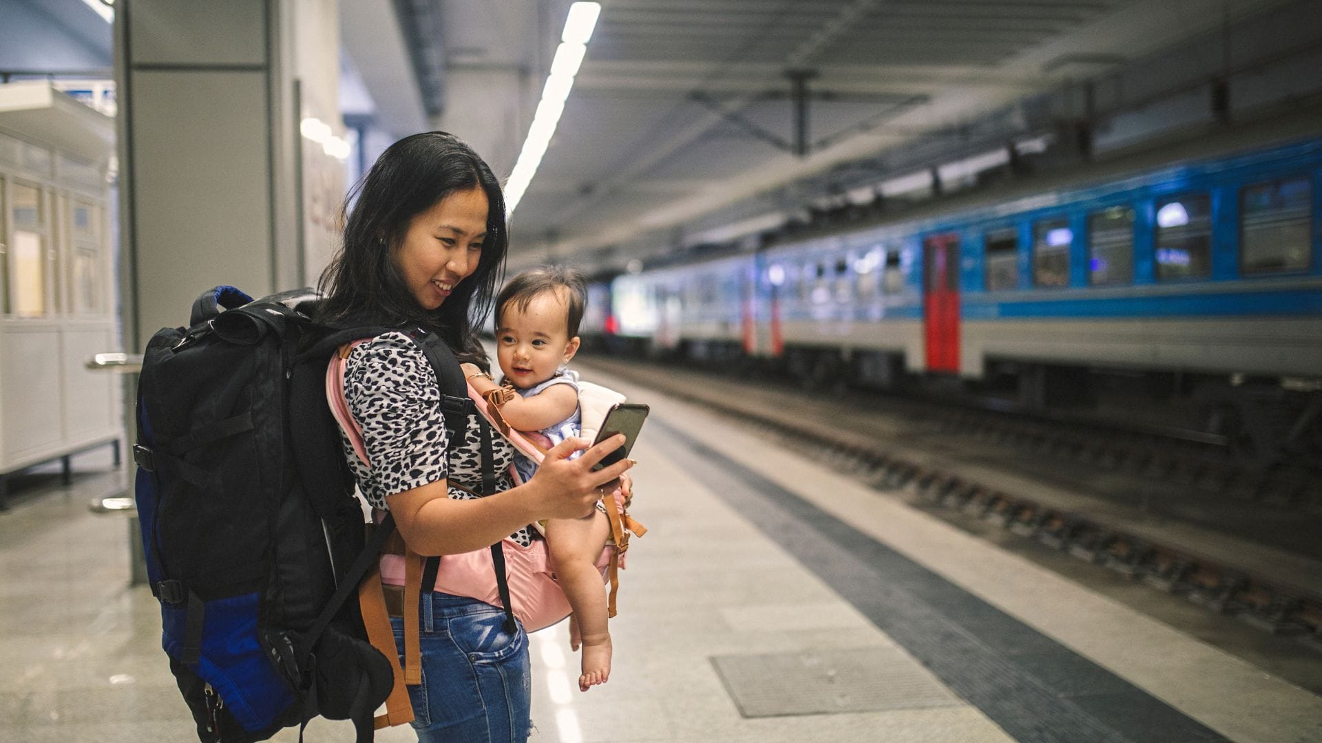 Mother-on-Train-Station-with-her-Baby