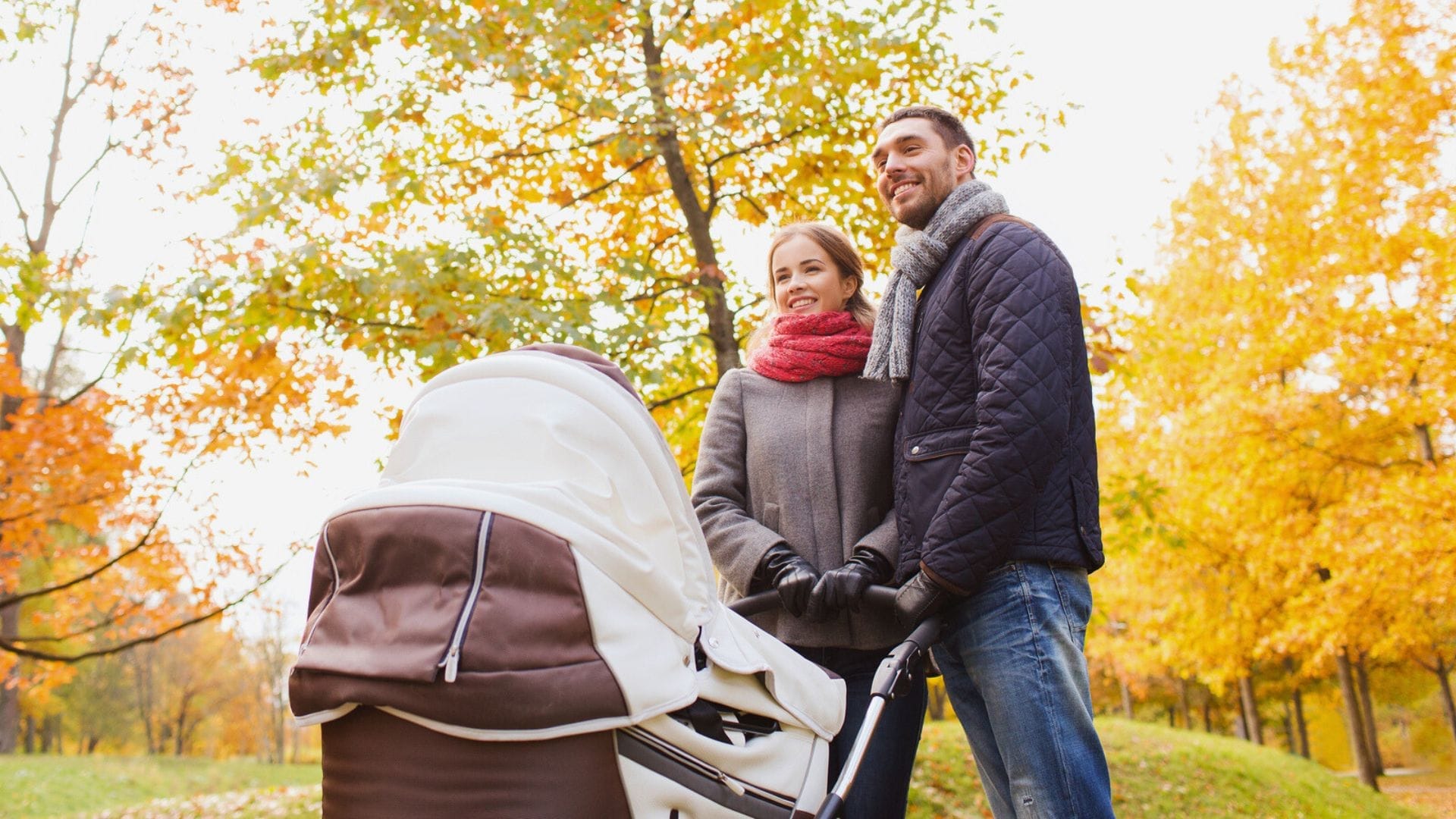 Couple-in-park-with-their-Baby-Wagon-Stroller